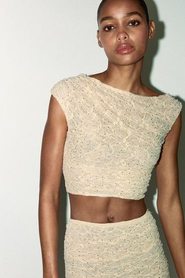TOP DRAPEADO ENCAJE STRASS - rosa claro de Zara