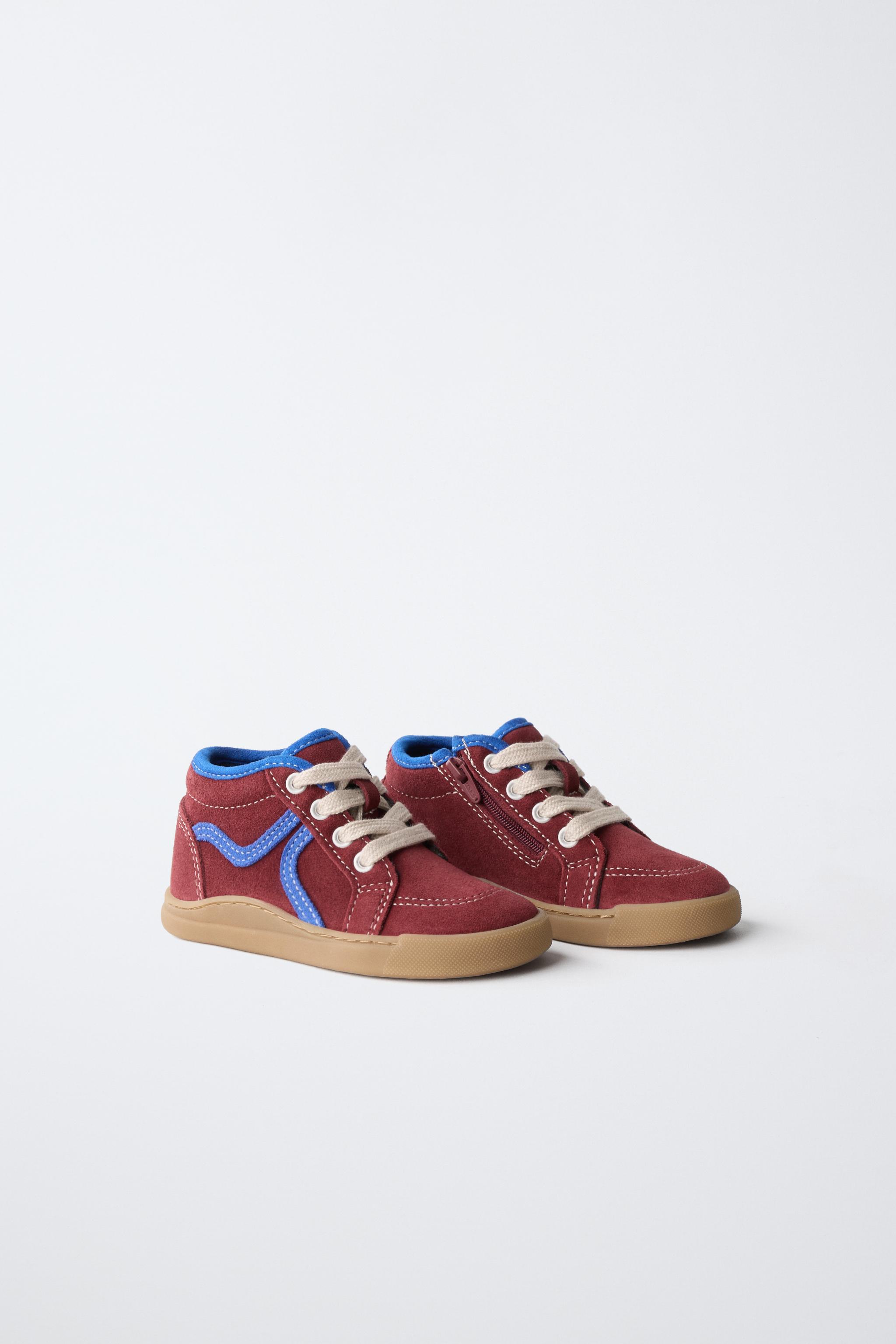 BASKETS MONTANTES EN CUIR