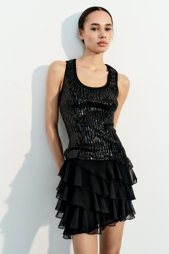 Shop the 'Sequin Knit Tank Top' & 'Sequin Knit Maxi Skirt' online