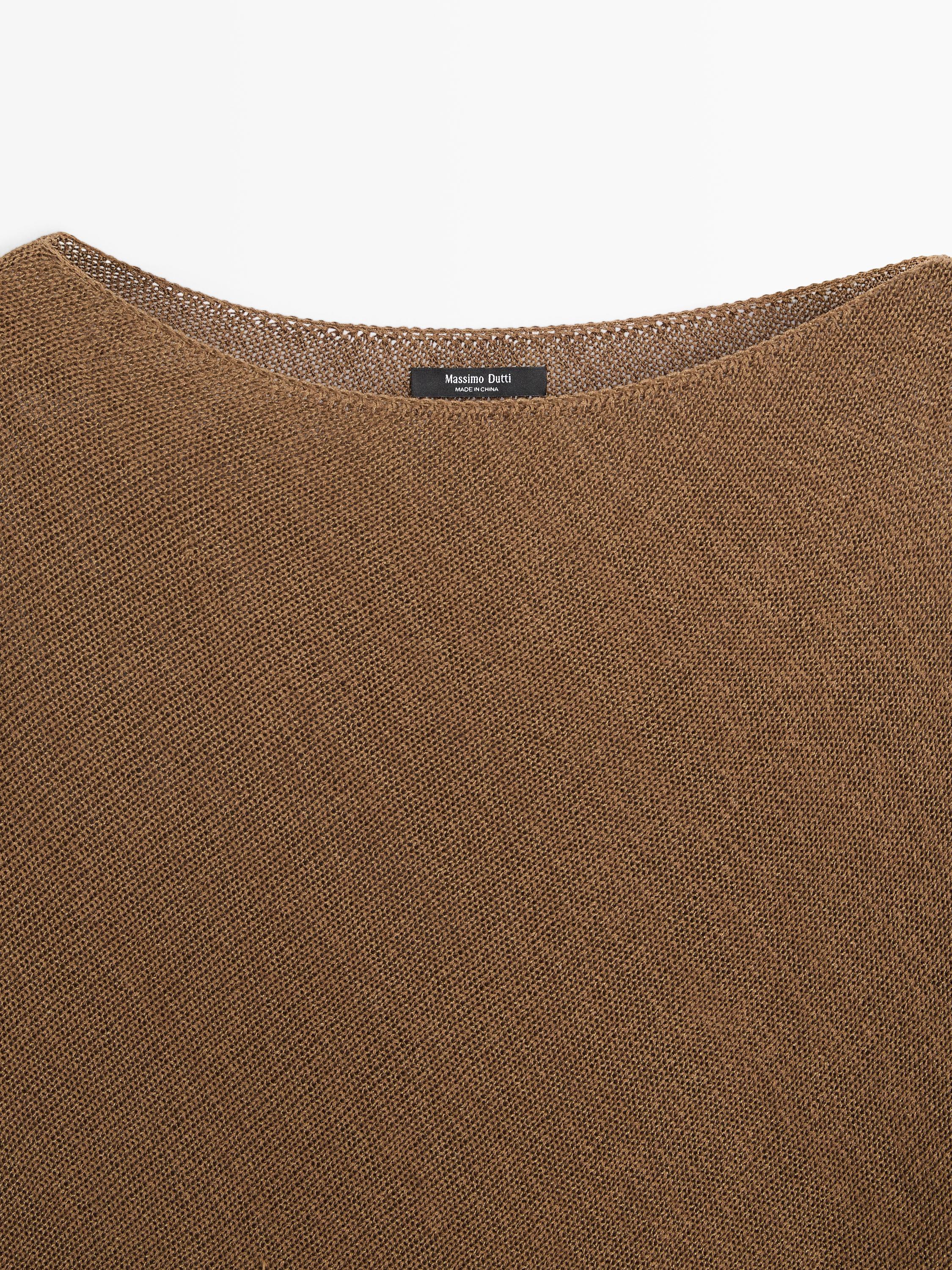 Asymmetric knit cape sweater