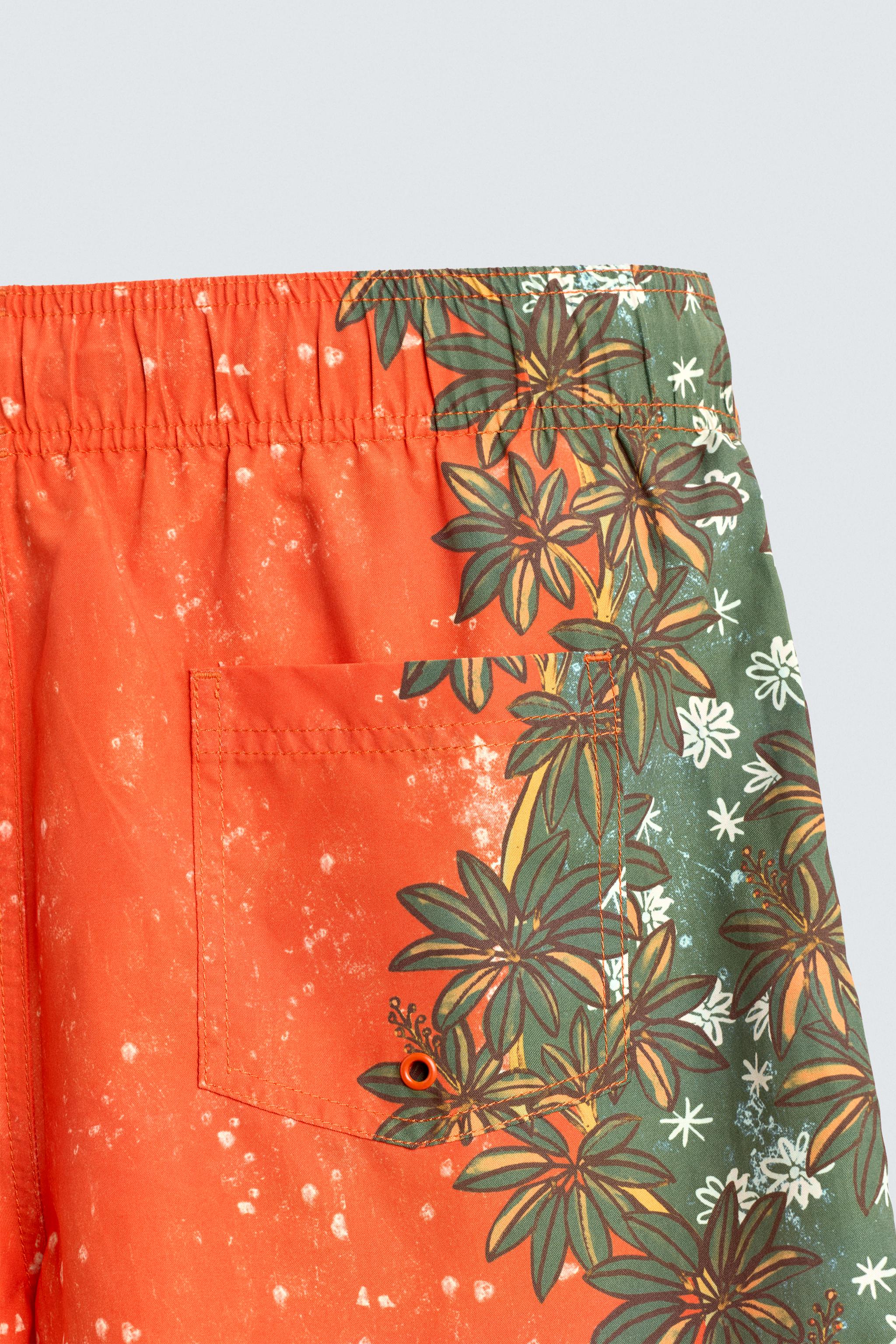 LONG FLORAL PRINT SWIM TRUNKS