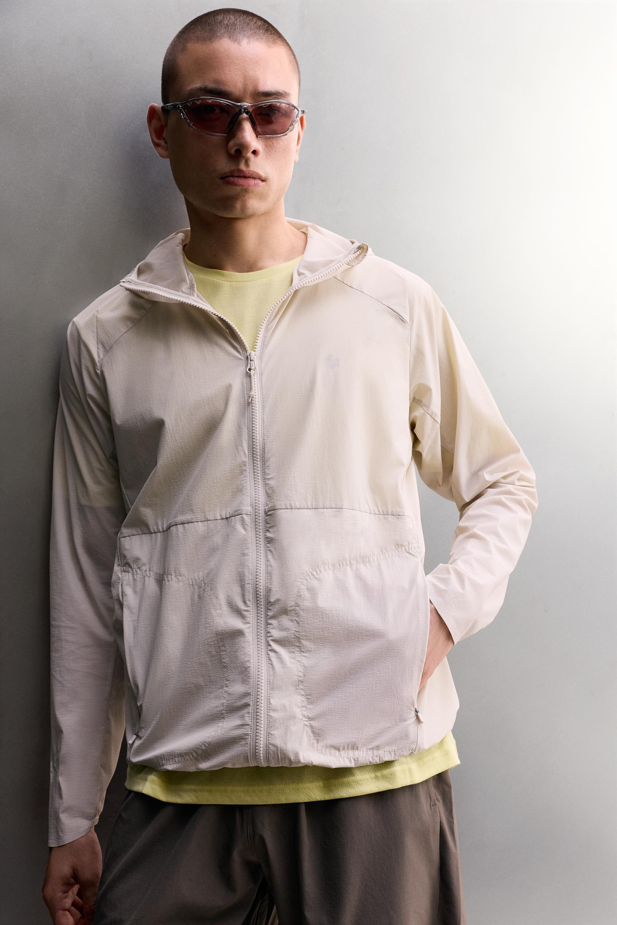 TECHNICAL WINDBREAKER JACKET