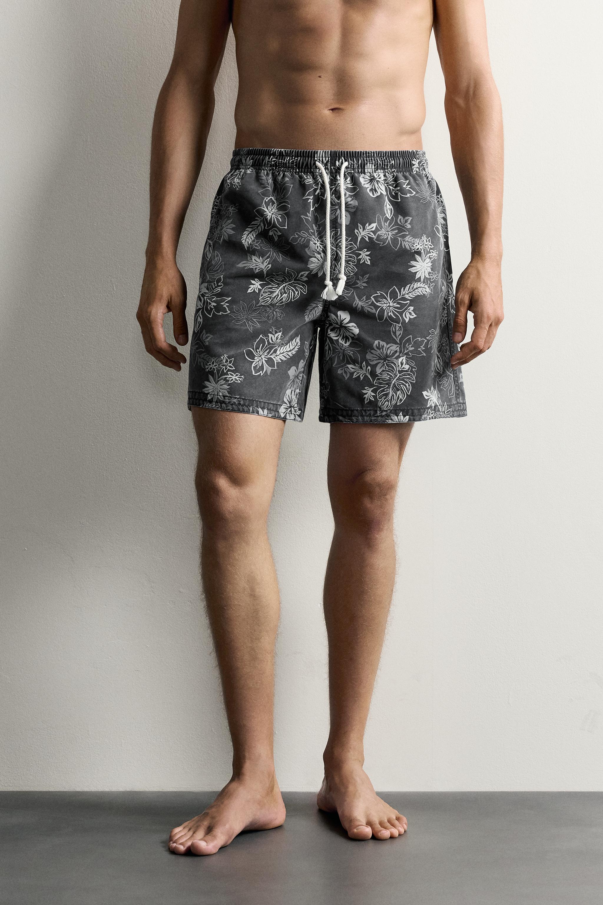 FLORAL PRINT LONGLINE SWIM SHORTS