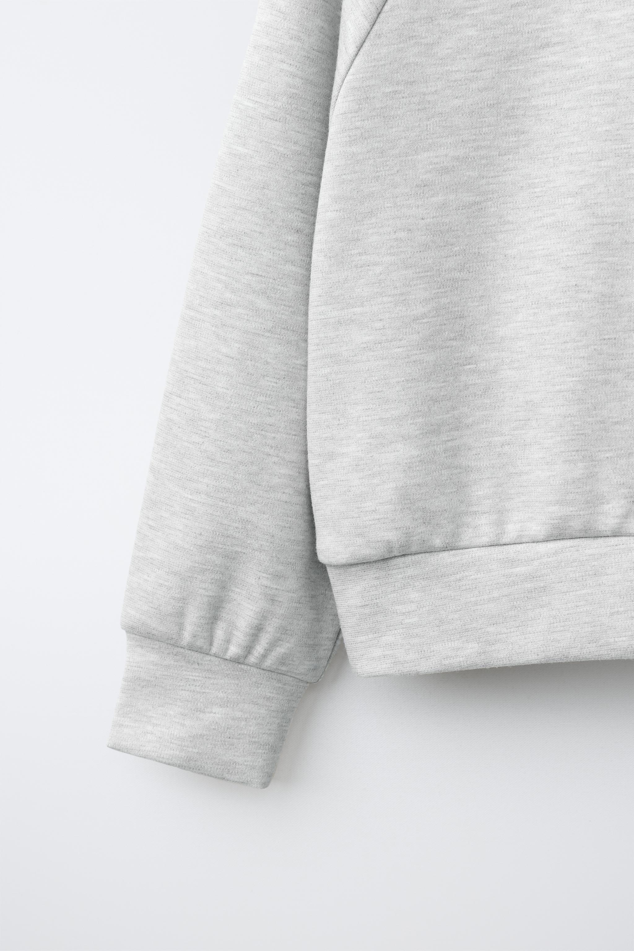 SWEAT À CAPUCHE INTERLOCK UNIE