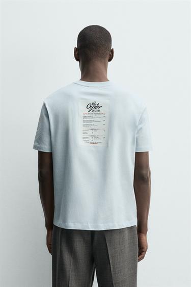 CAMISETA ESTAMPADO CONTRASTE PARCHE - Celeste de Zara