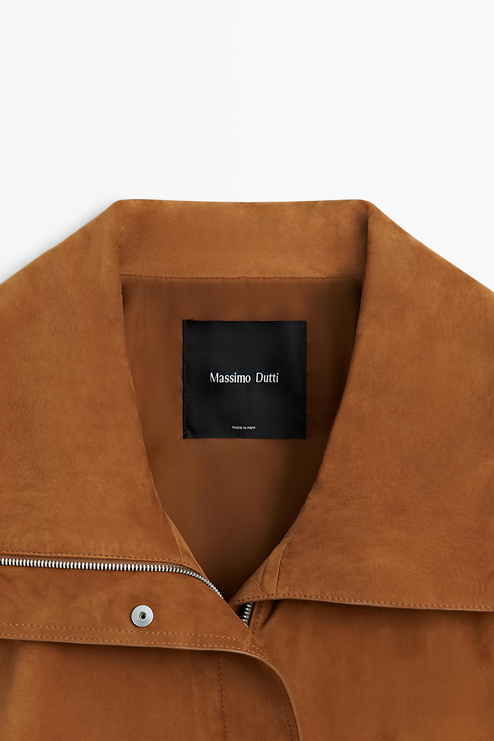 Manteau col montant en cuir nubuck