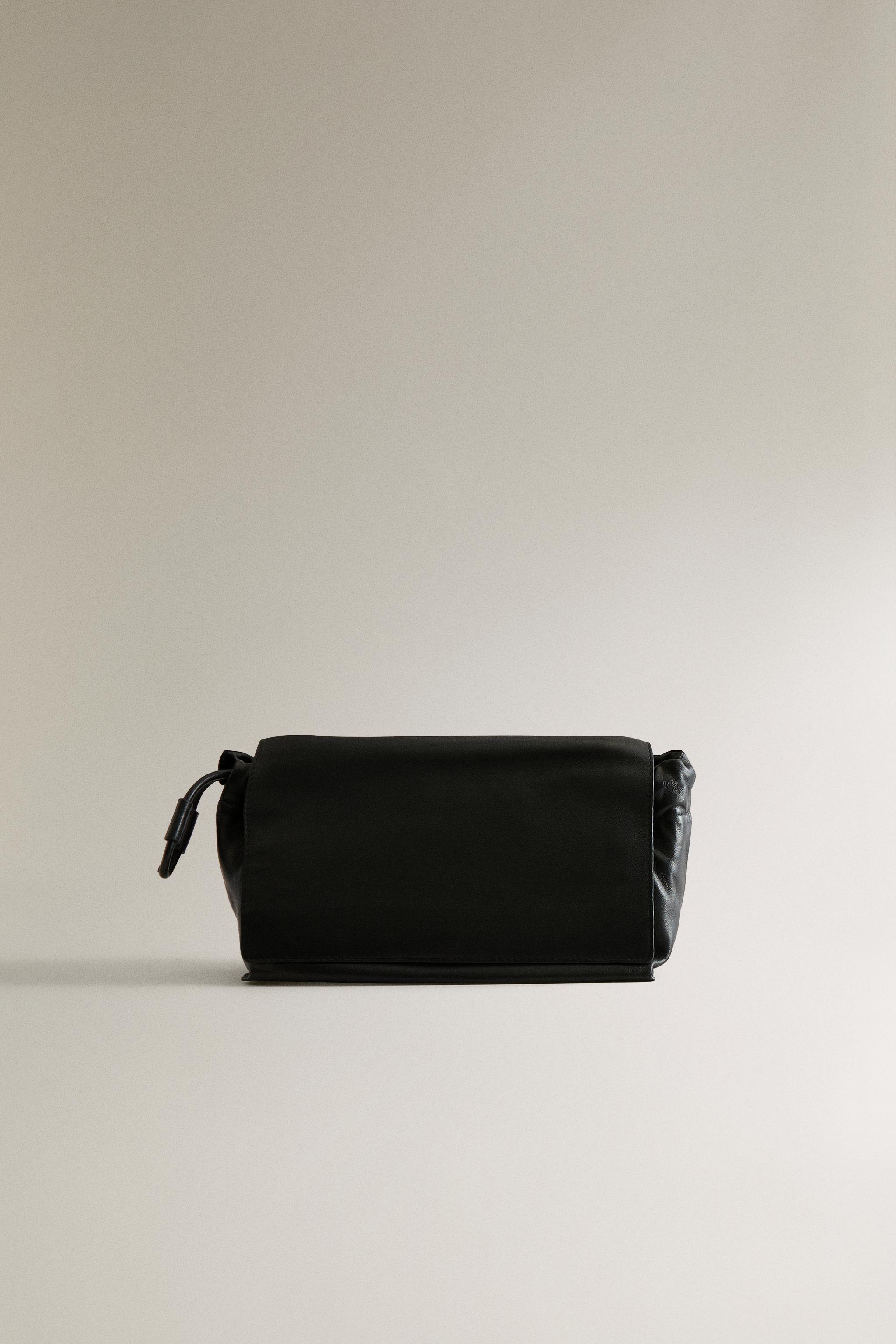 TROUSSE DE TOILETTE POCHETTE CUIR
