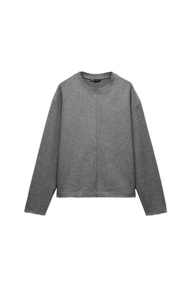 Front view of a grey sweatshirt with a crew neck and long sleeves.