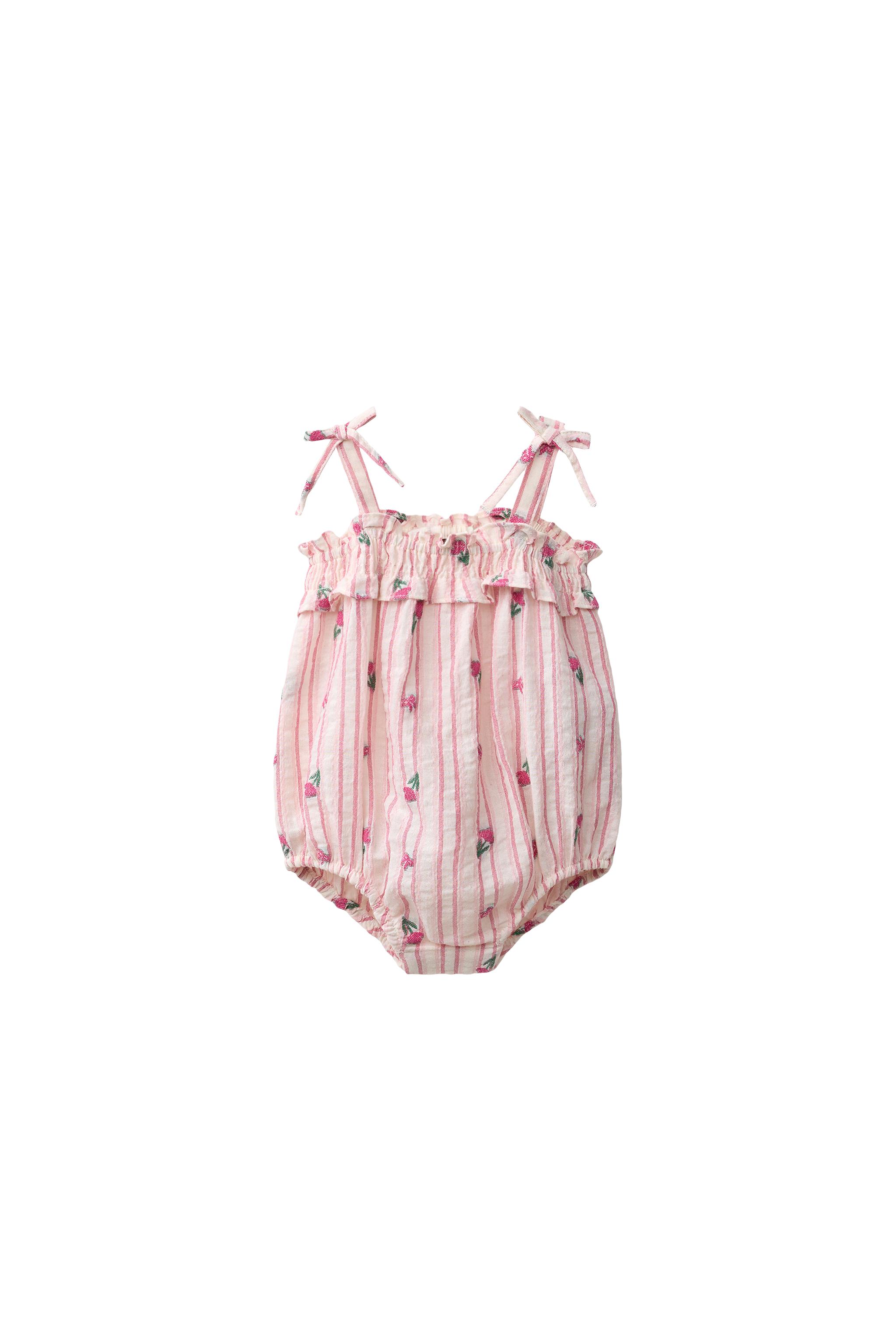 PIJAMA D'UNA PEÇA DE RATLLES I TULIPES