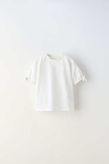 ОДНОТОННАЯ ФУТБОЛКА С БАНТАМИ — БЕЛЫЙ от Zara — изображение 0