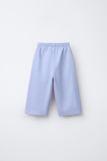 WIDE-LEG INTERLOCK TROUSERS WITH RAISED SLOGAN - Pastel blue by Zara - Image 1