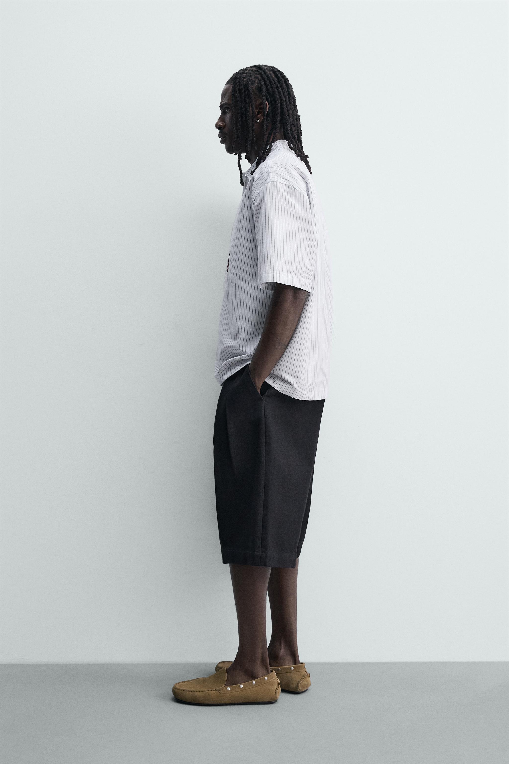 PRINTED TEXT BOXY FIT POLO SHIRT