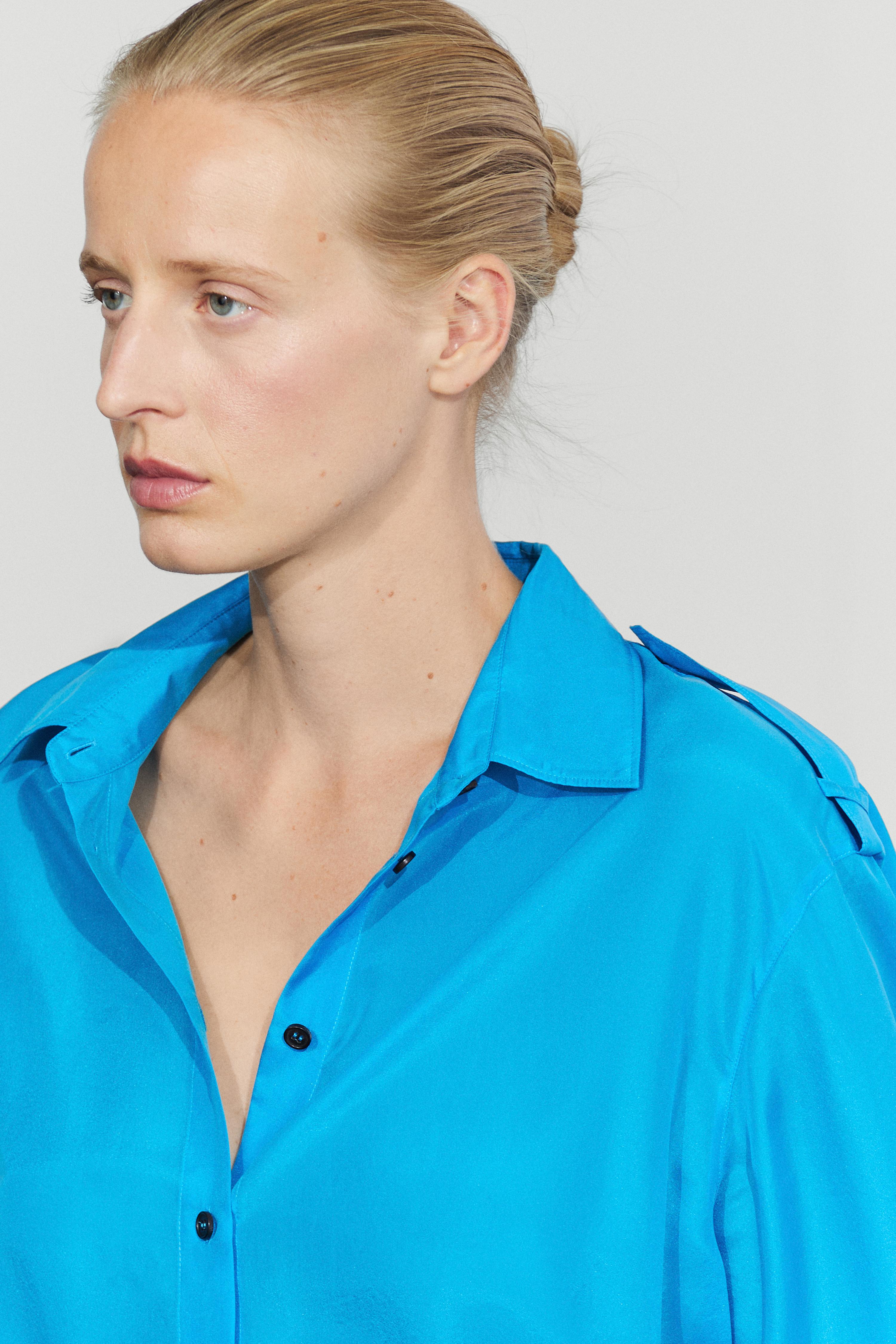 100% silk flowing shirt with shoulder detail