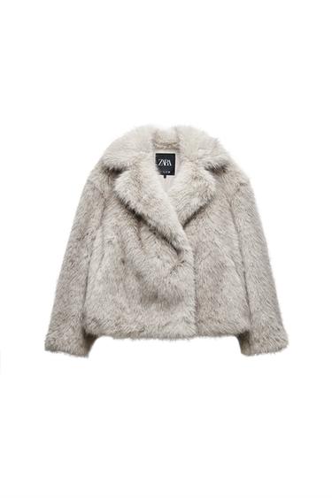 Front view of a grey faux leather jacket with a wide collar and visible label.