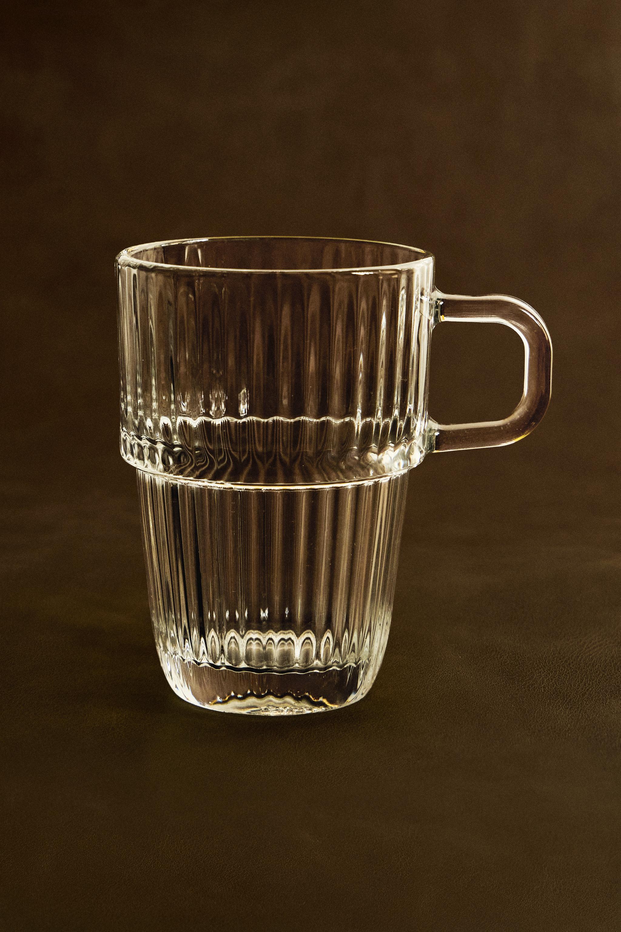 GLASS MUG WITH A RAISED DESIGN
