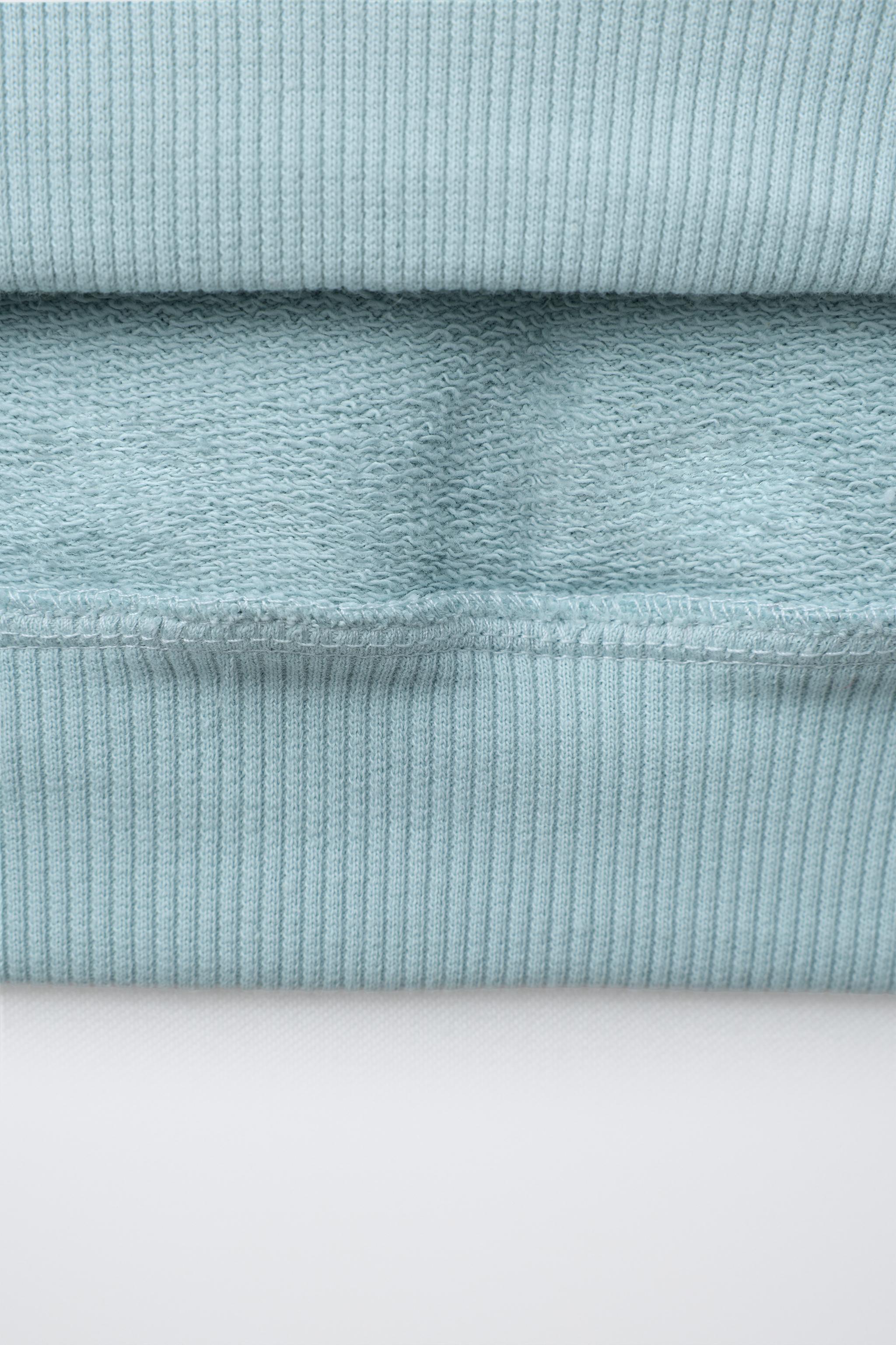 SWEAT À CAPUCHE IMPRIMÉ SURF