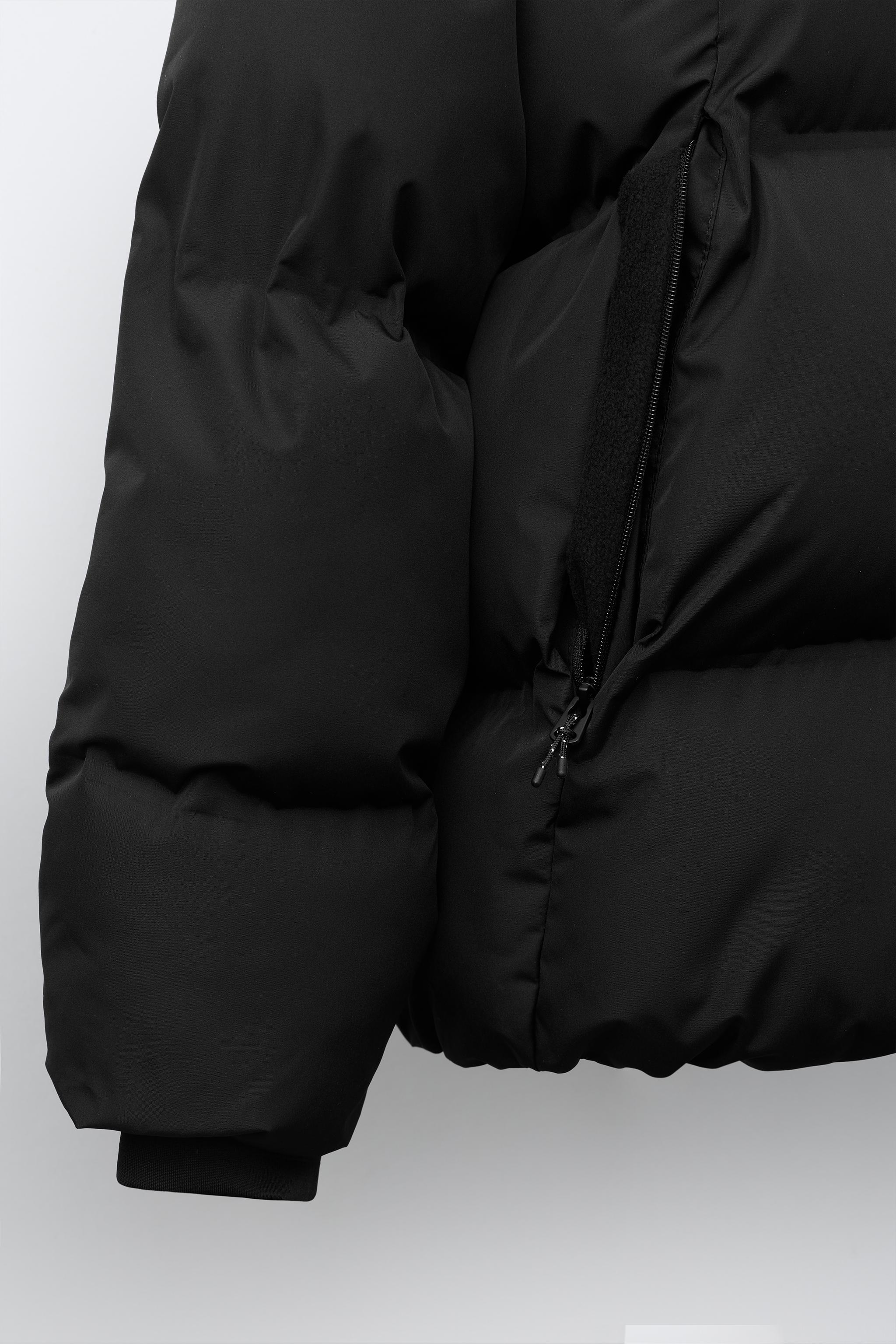 BLOUSON MATELASSÉ À CAPUCHE DÉPERLANT