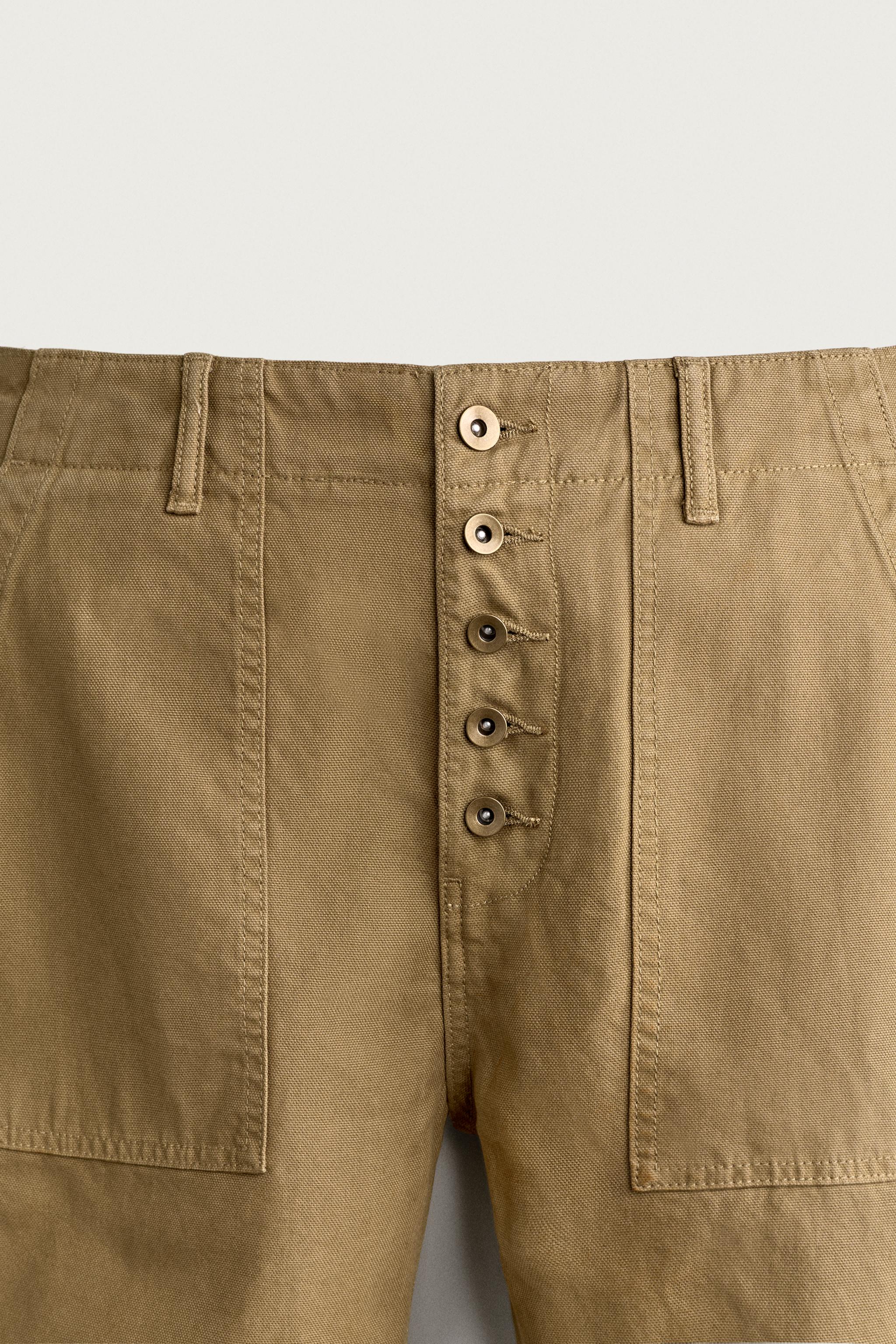BUTTON FLARE FIT PANTS