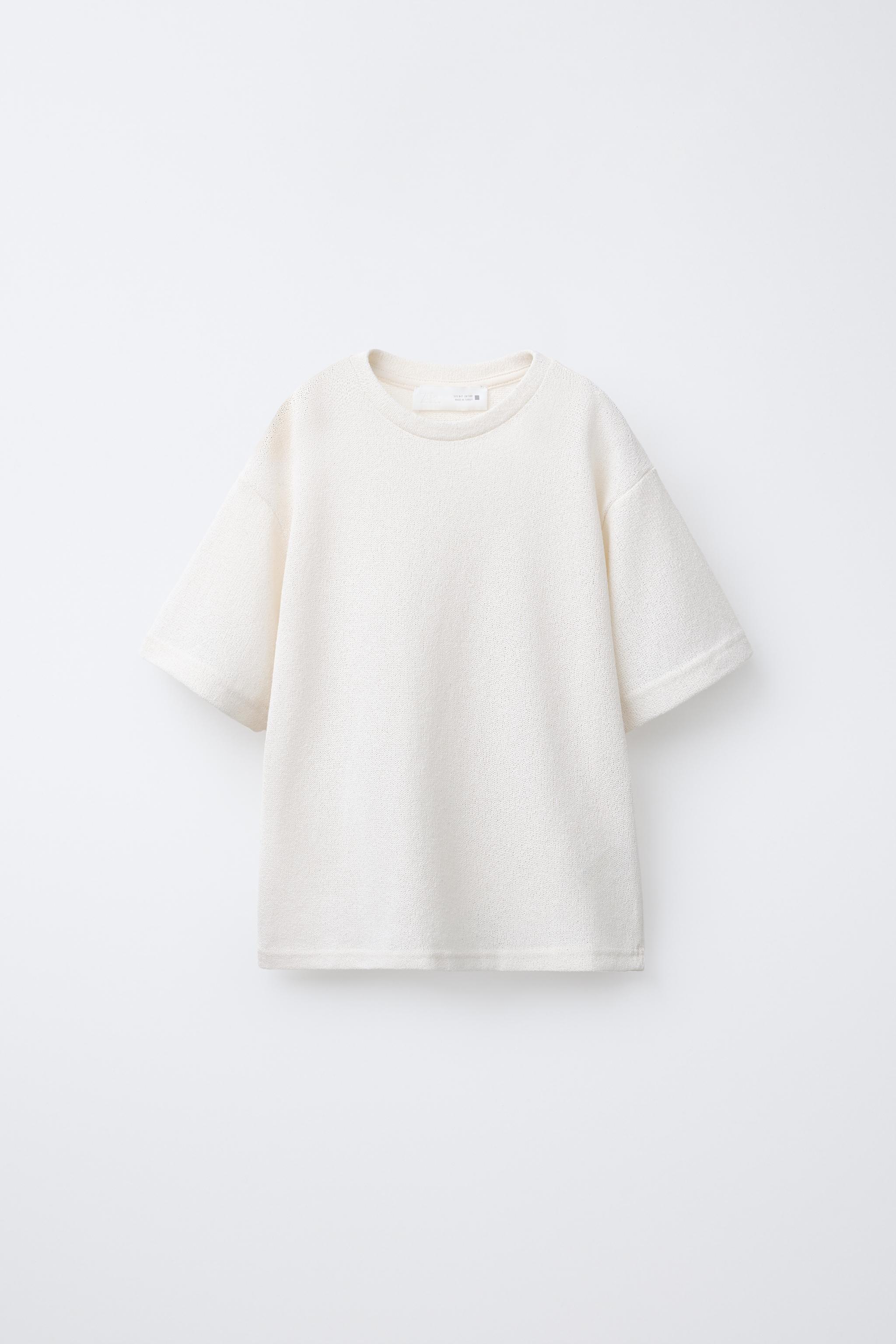 【YOURNUS】Cream Crople Knit T-shirt TEXTURED KNITTED COTTON T-SHIRT - APRICOT | COS