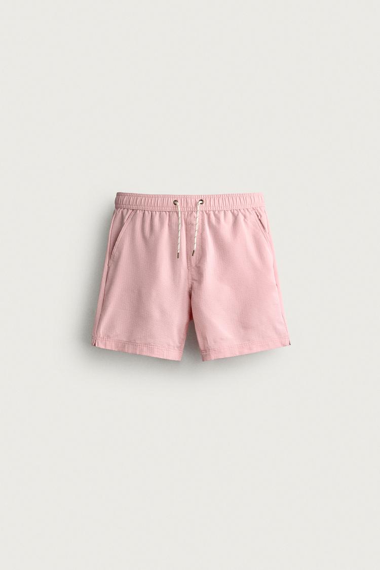 LONG SEERSUCKER SWIM SHORTS — Pale pink