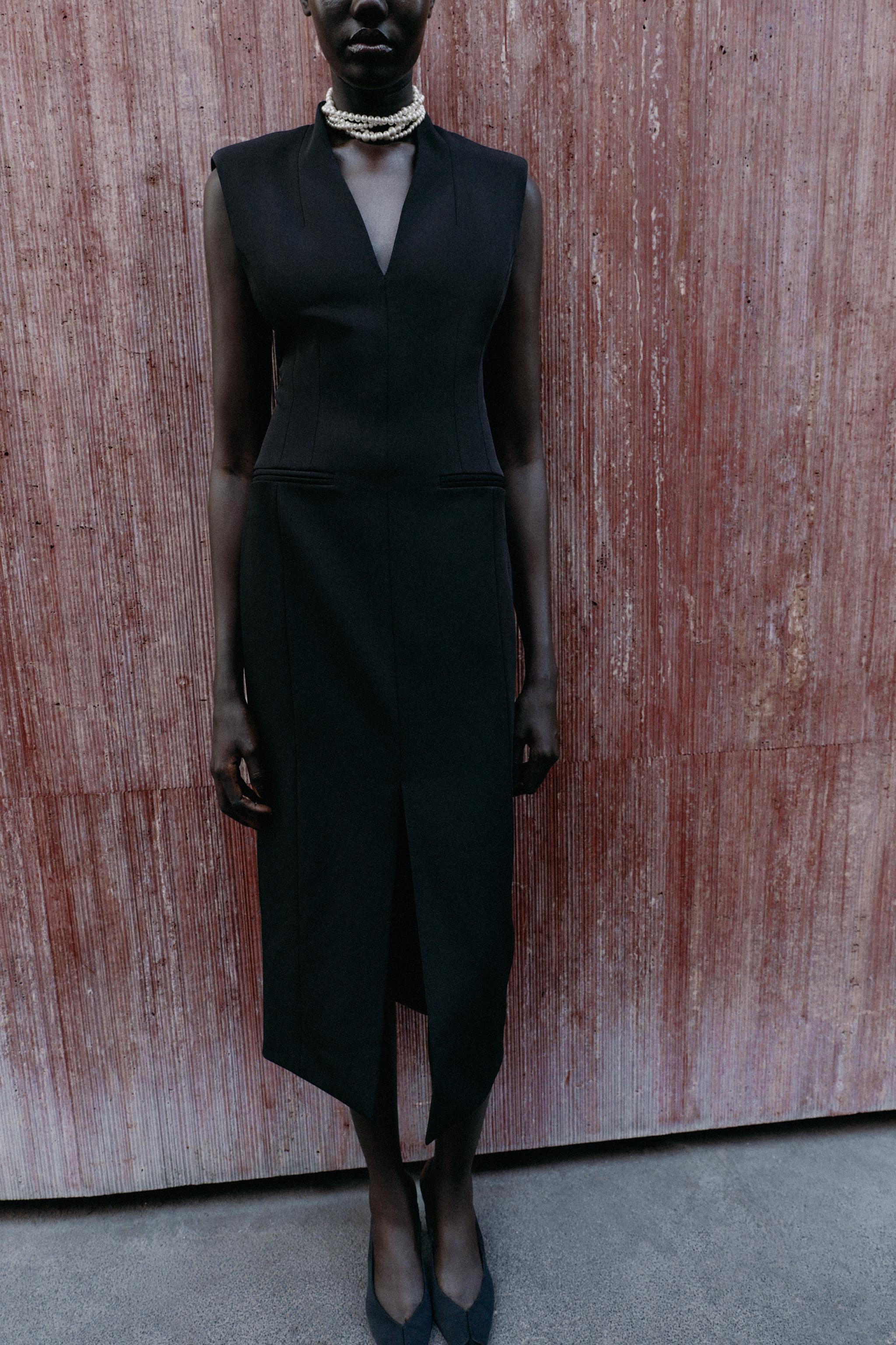 MIDI SLEEVELESS DRESS