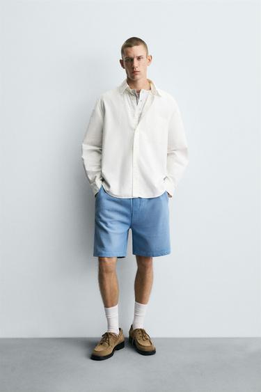 SPRAY WASHED BERMUDA SHORTS - Light blue by Zara