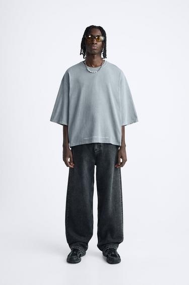 ФУТБОЛКА ИЗ ТКАНИ С ЭФФЕКТОМ ПОТЕРТОСТИ С НАДПИСЬЮ — ЛИНЯЛЫЙ СИНИЙ от Zara — изображение 0