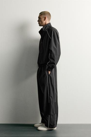WATER-REPELLENT TECHNICAL CONTRAST TROUSERS - Black by Zara
