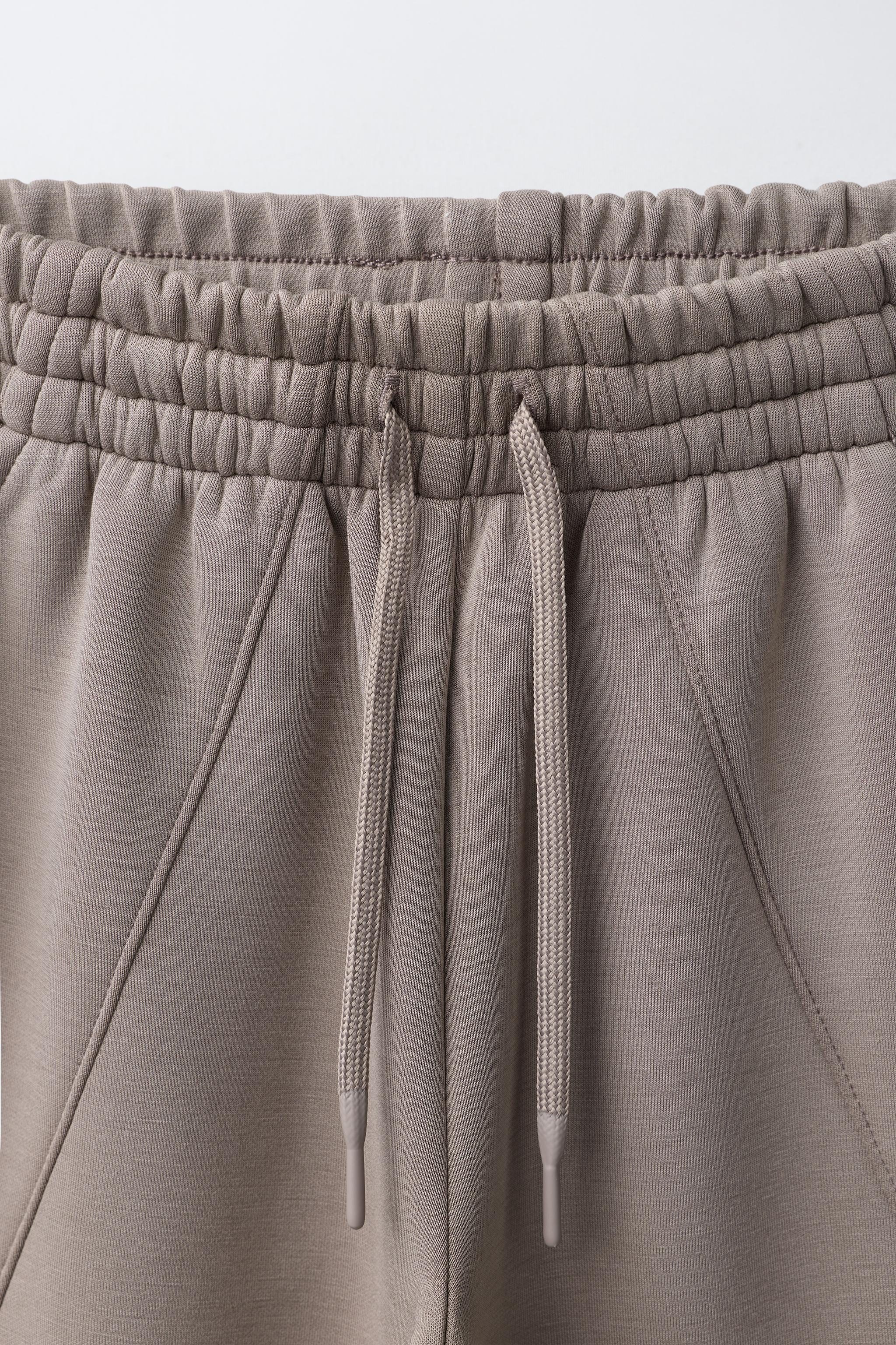 PANTALON SPORTY À JAMBES LARGES