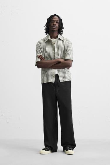 Zara RELAXED FIT PANTS WITH CONTRASTING STRIPES - Black - Image 0