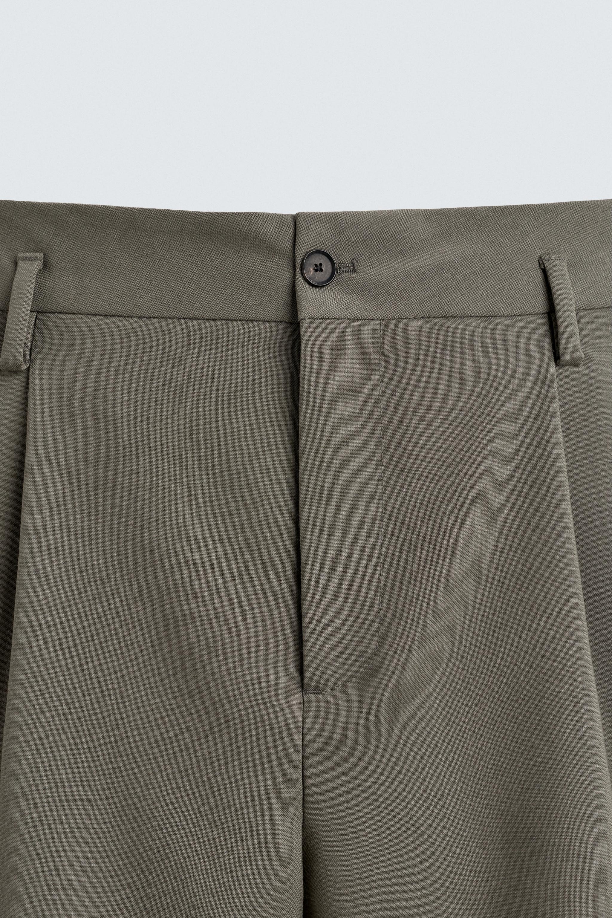 100% WOOL PLEATED SHORTS