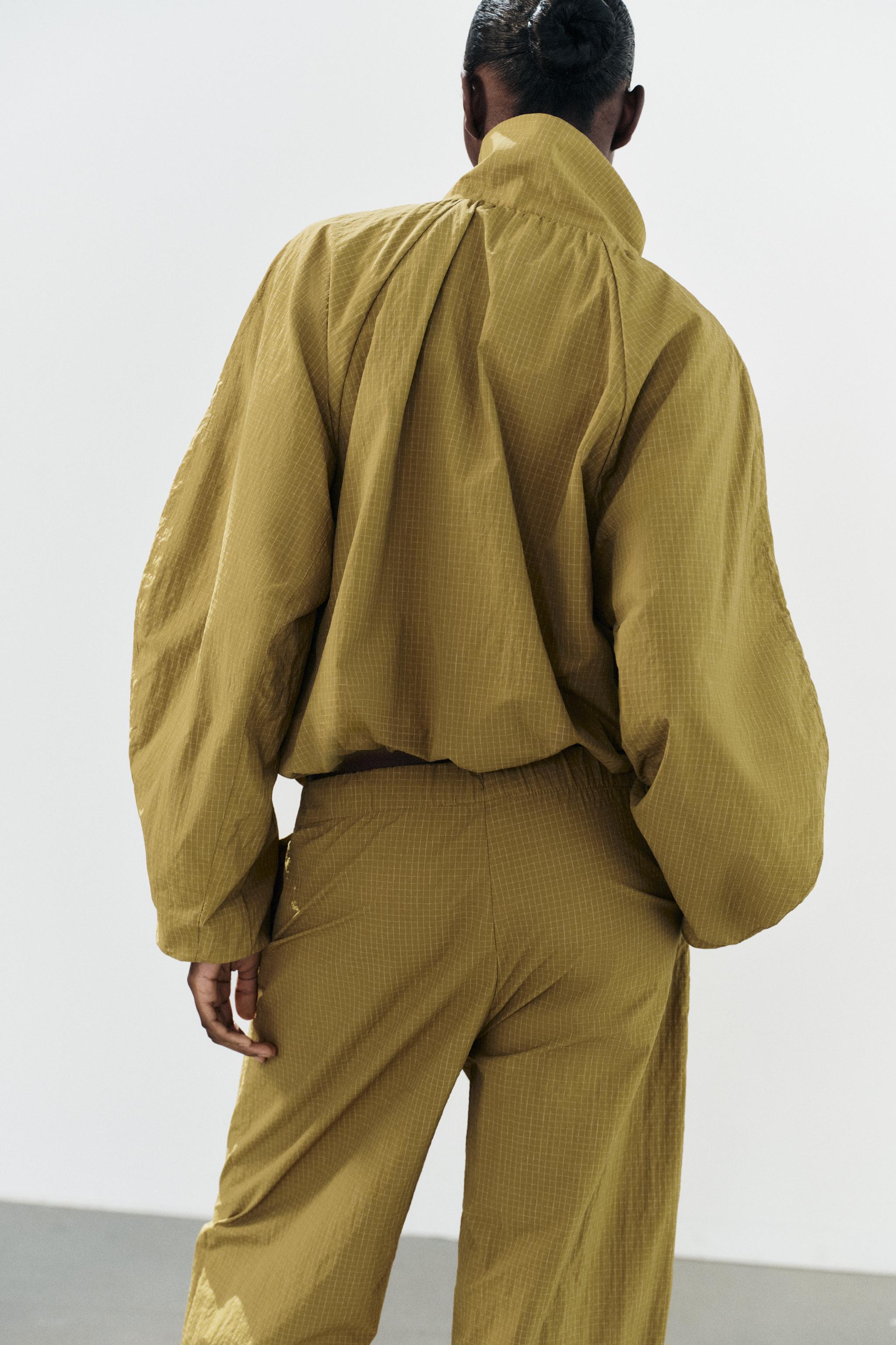 VESTE PLIS TISSU TECHNIQUE