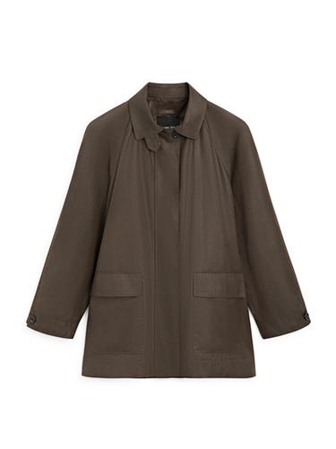 Parka larga detalle bolsillos - Negro oro de Zara