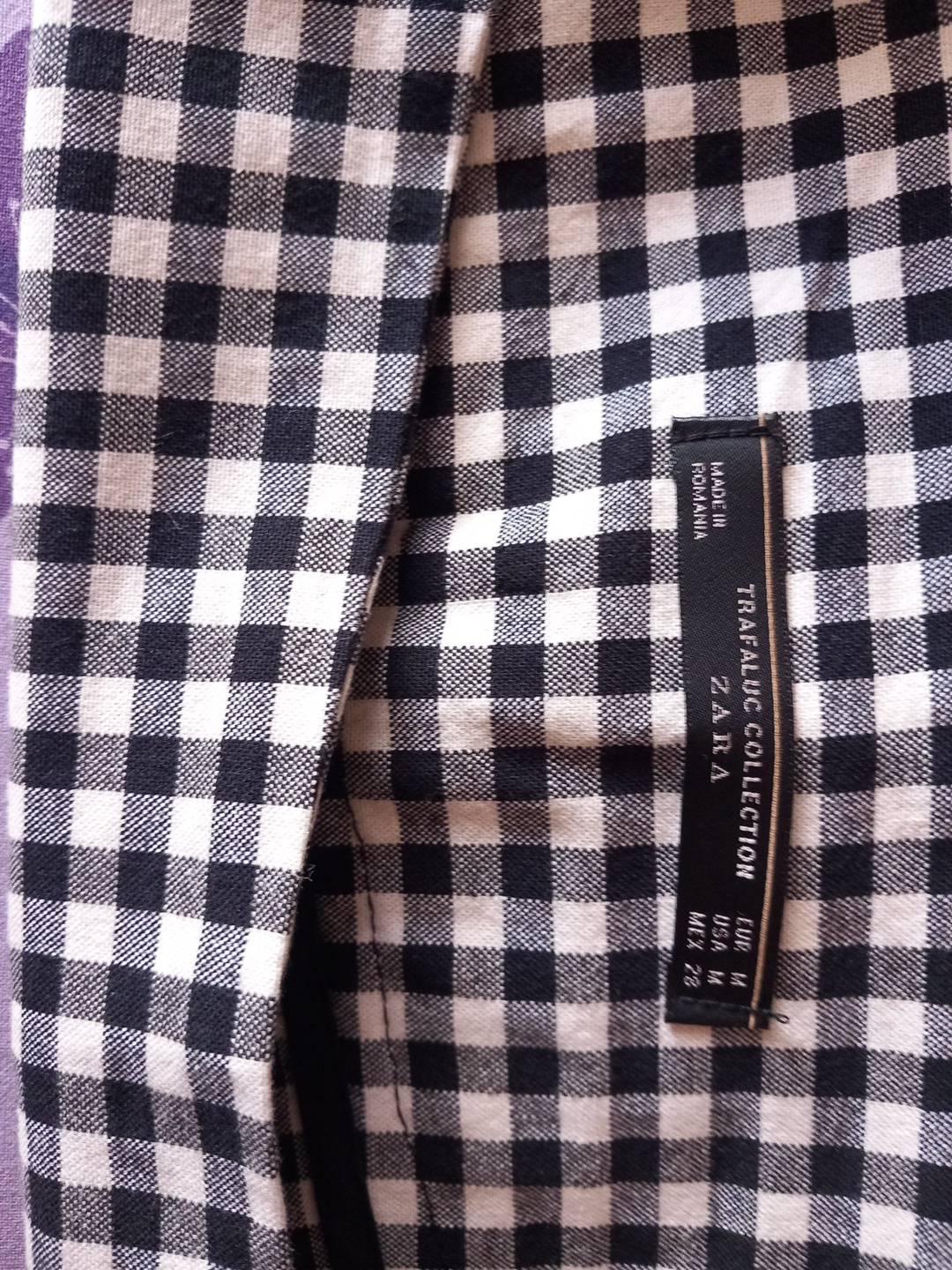 SHORTS VITA ALTA A QUADRETTI BIANCO/NERO. - Image 4