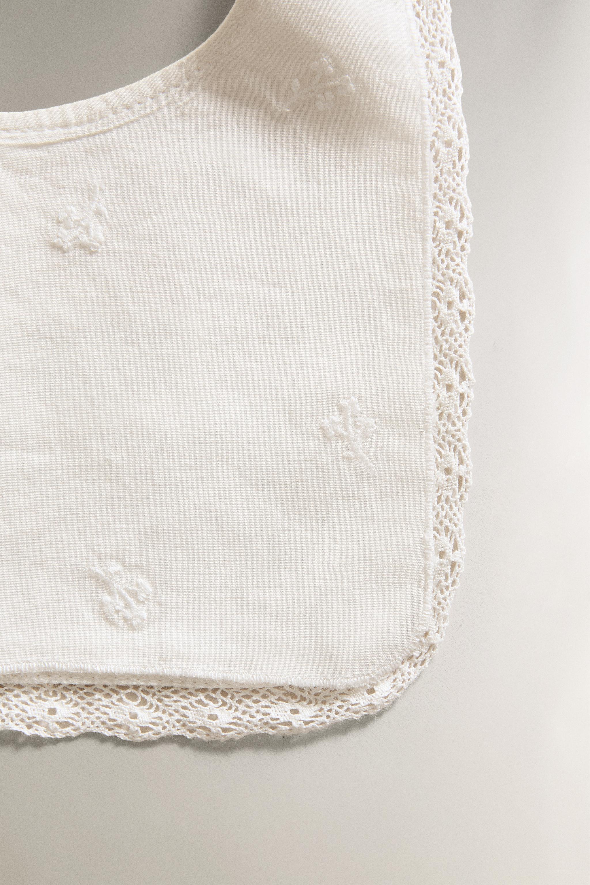 BABY BIB WITH FLORAL EMBROIDERY