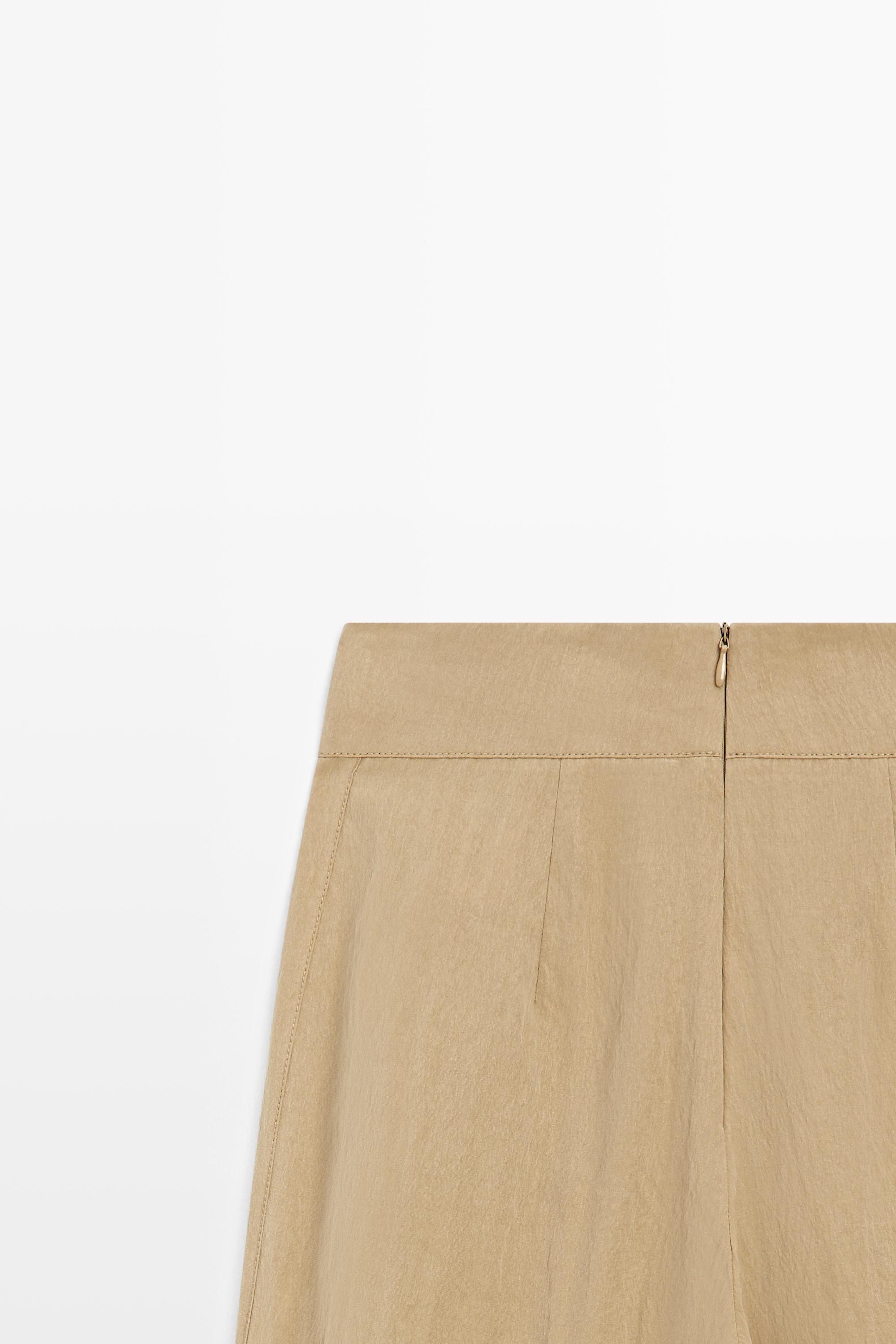 Palazzo trousers with box pleats