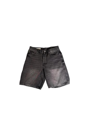 Black denim shorts with a washed effect on a white background.