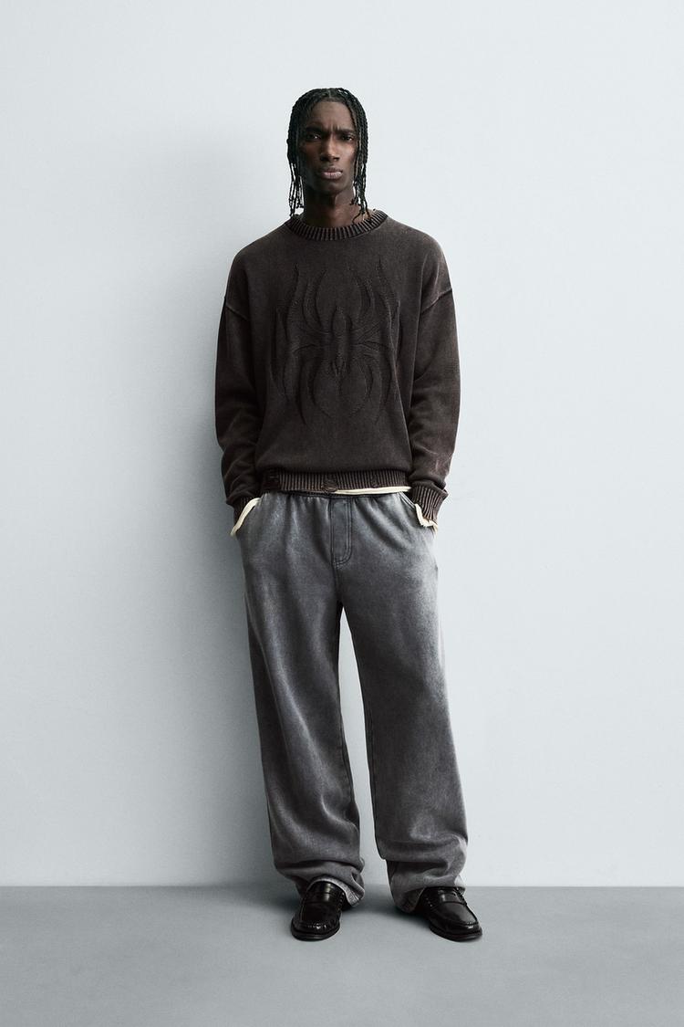 REVERSIBLE SWEATER WITH RIPPED EFFECT