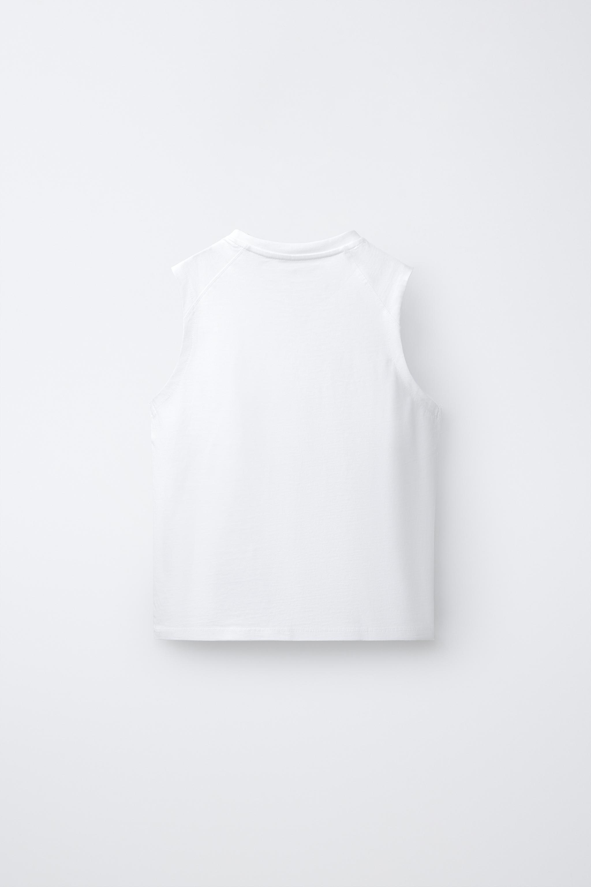 T-SHIRT UNI SANS MANCHES
