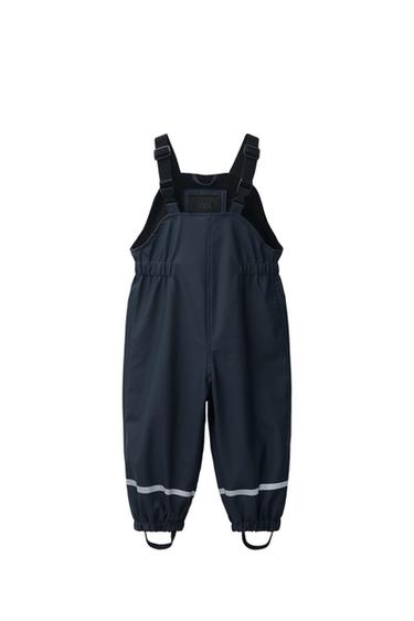 POGUMOVANÉ KALHOTY S LACLEM WATER-RESISTANT - Modrá Navy od Zara