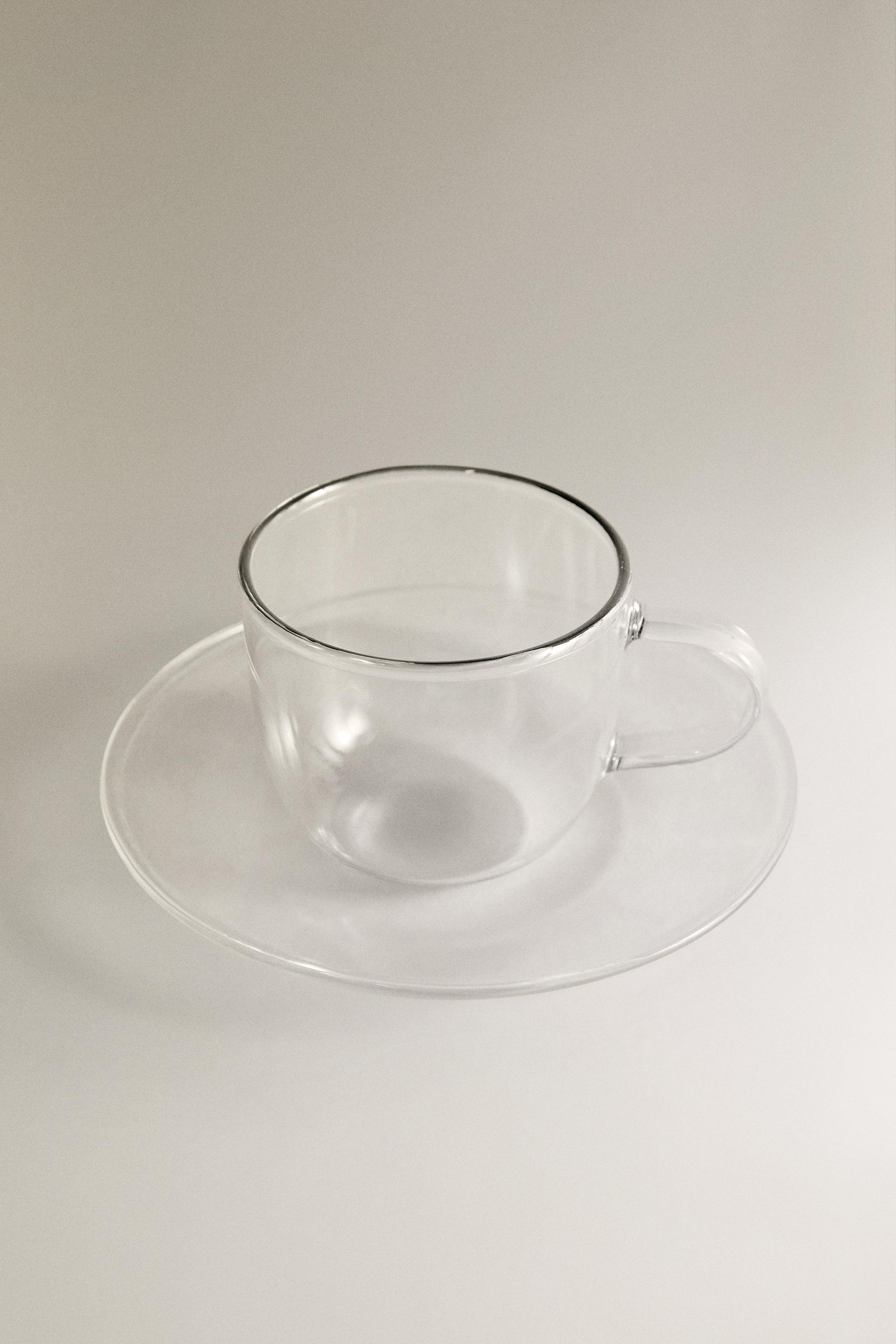 BOROSILICATE GLASS TEA CUP AND SAUCER WITH SILVER RIM