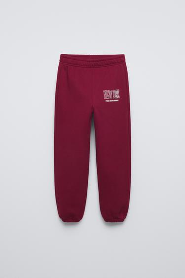 JOGGER TROUSERS WITH FLOCKED SLOGAN - Burgundy by Zara