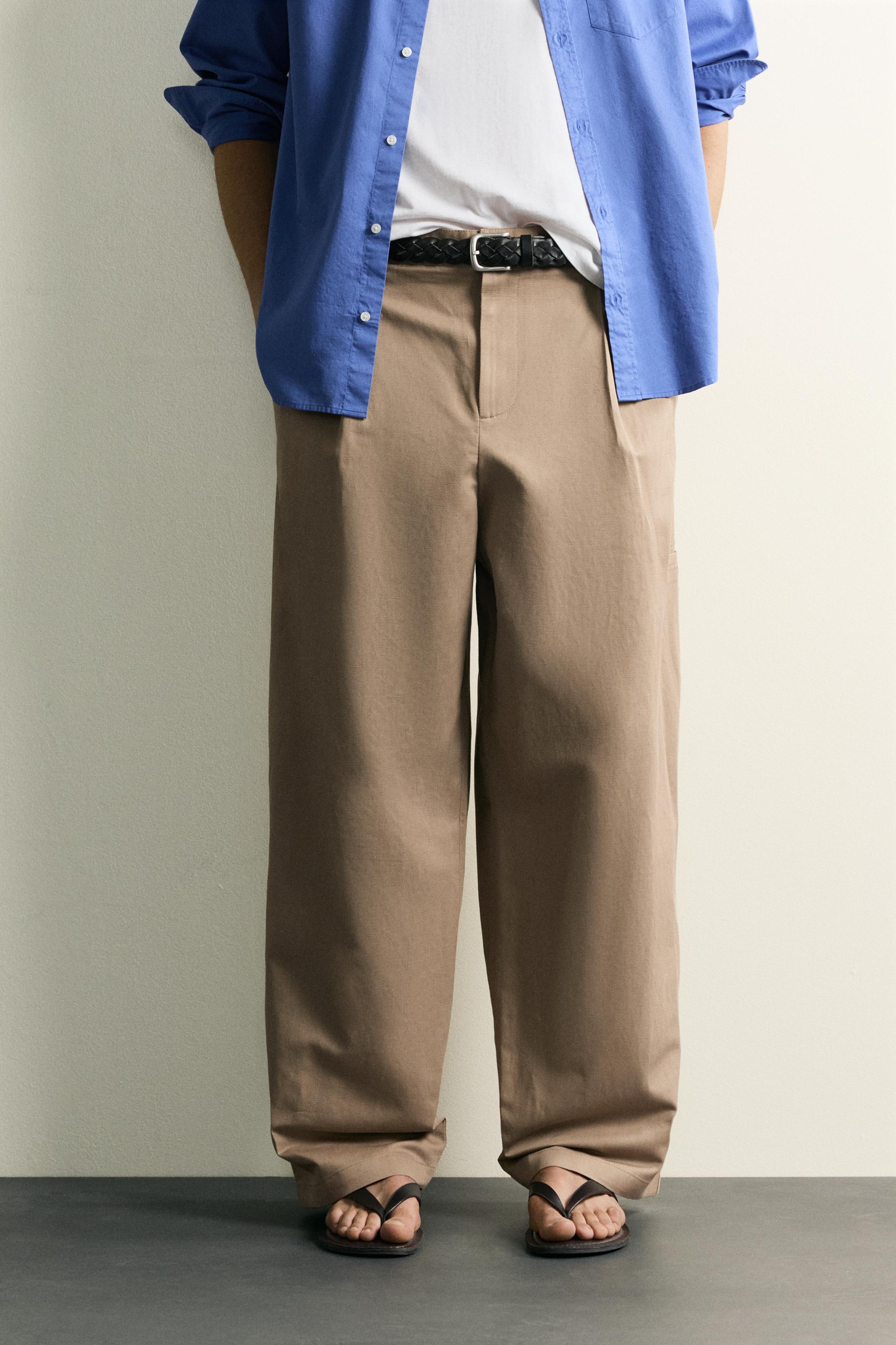 RELAXED FIT PLEATED PANTS