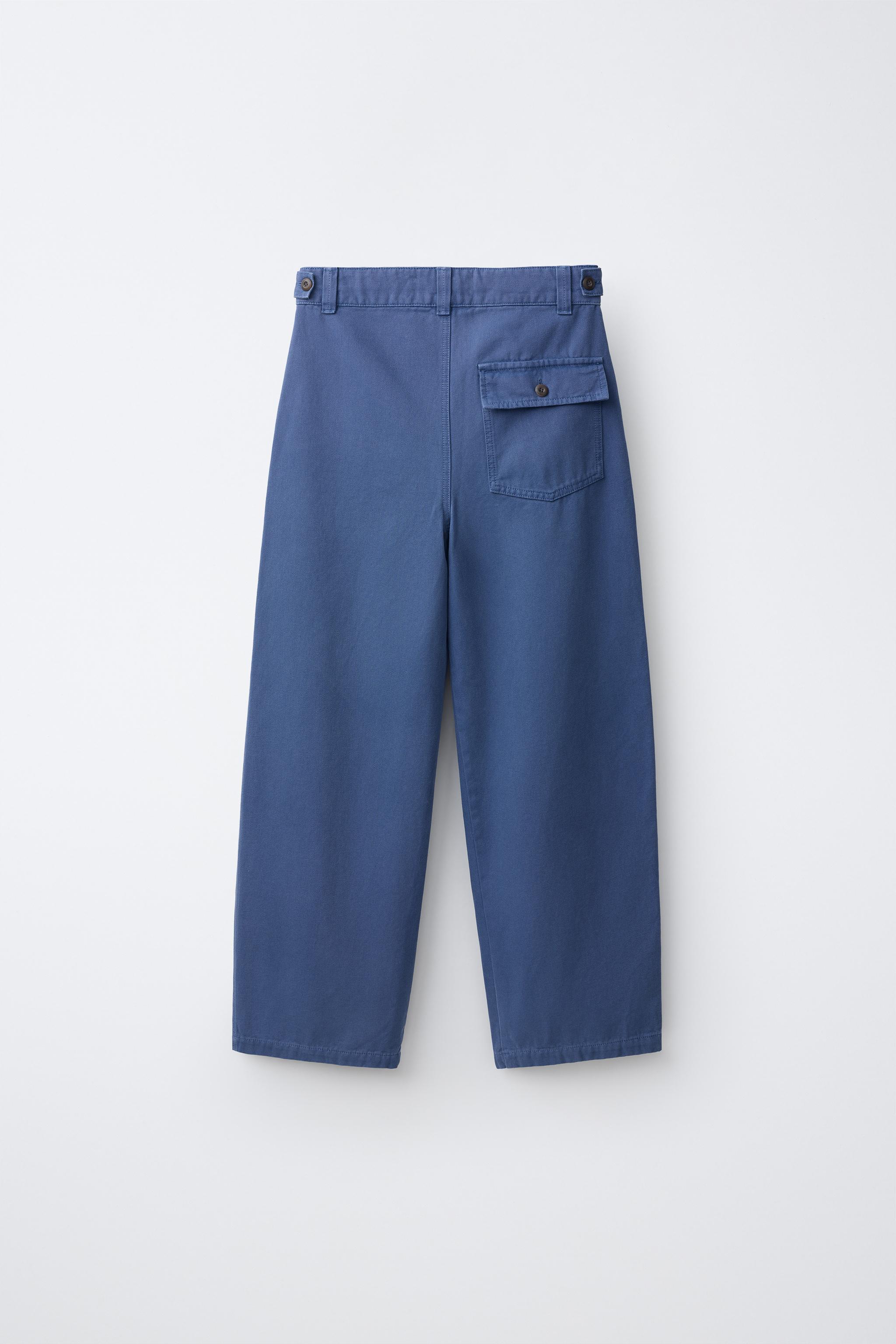 DISTRESSED WIDE-LEG PANTS