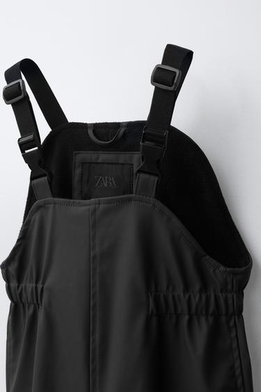 WATER-RESISTANT RUBBERISED JUMPSUIT - Black by Zara