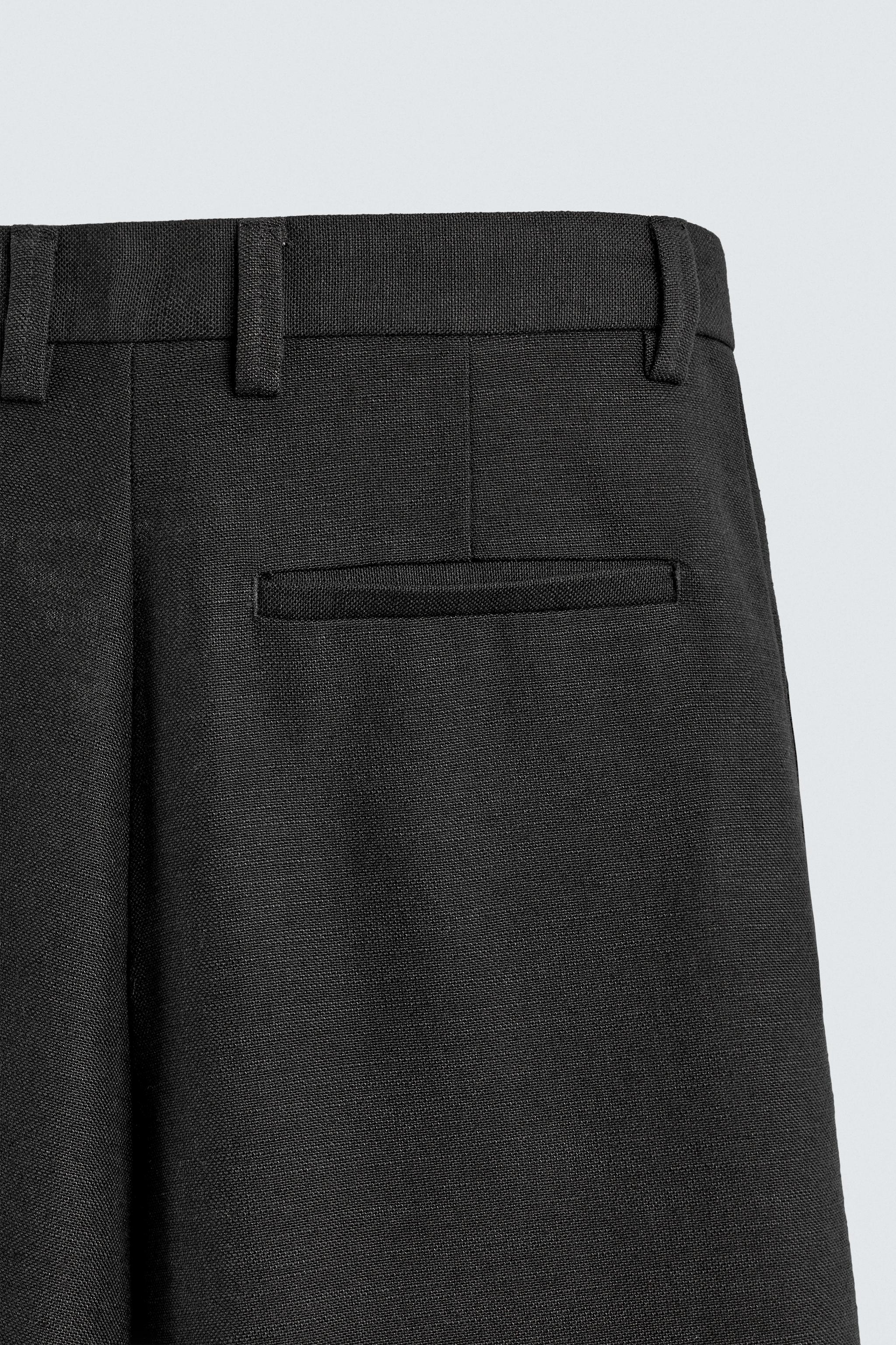 PLEATED RELAXED FIT PANTS