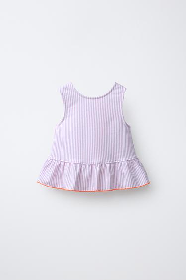 CAMISETA RAYAS PEPLUM Y PICUETA CONTRASTE - Malva claro de Zara - Imagen 0