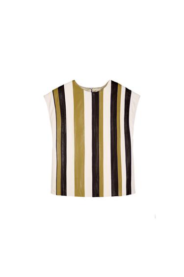 Front view of a sleeveless blouse with vertical stripes in black, white, and olive.