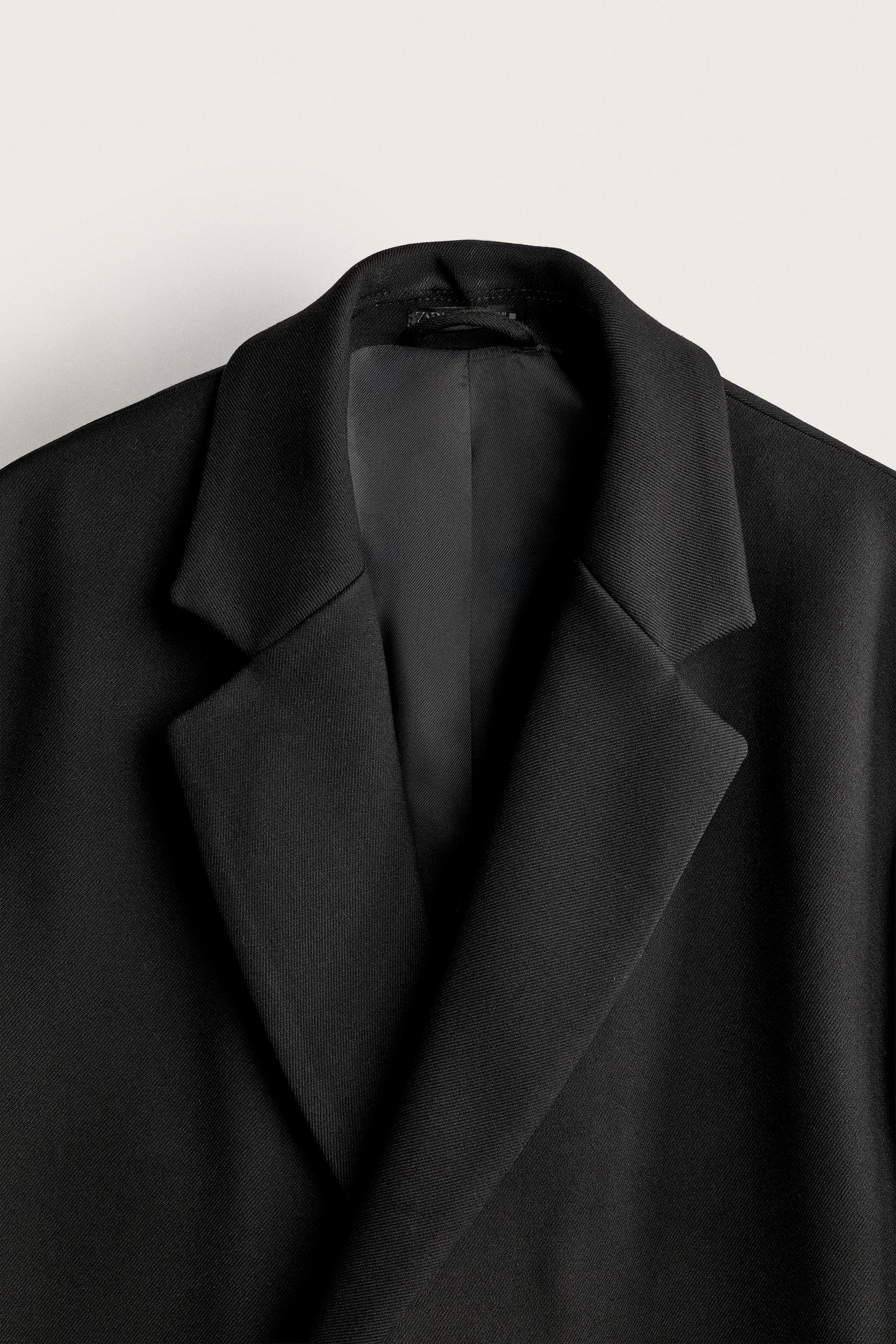 MANTEAU À BOUTONNAGE CROISÉ COUPE OVERSIZE