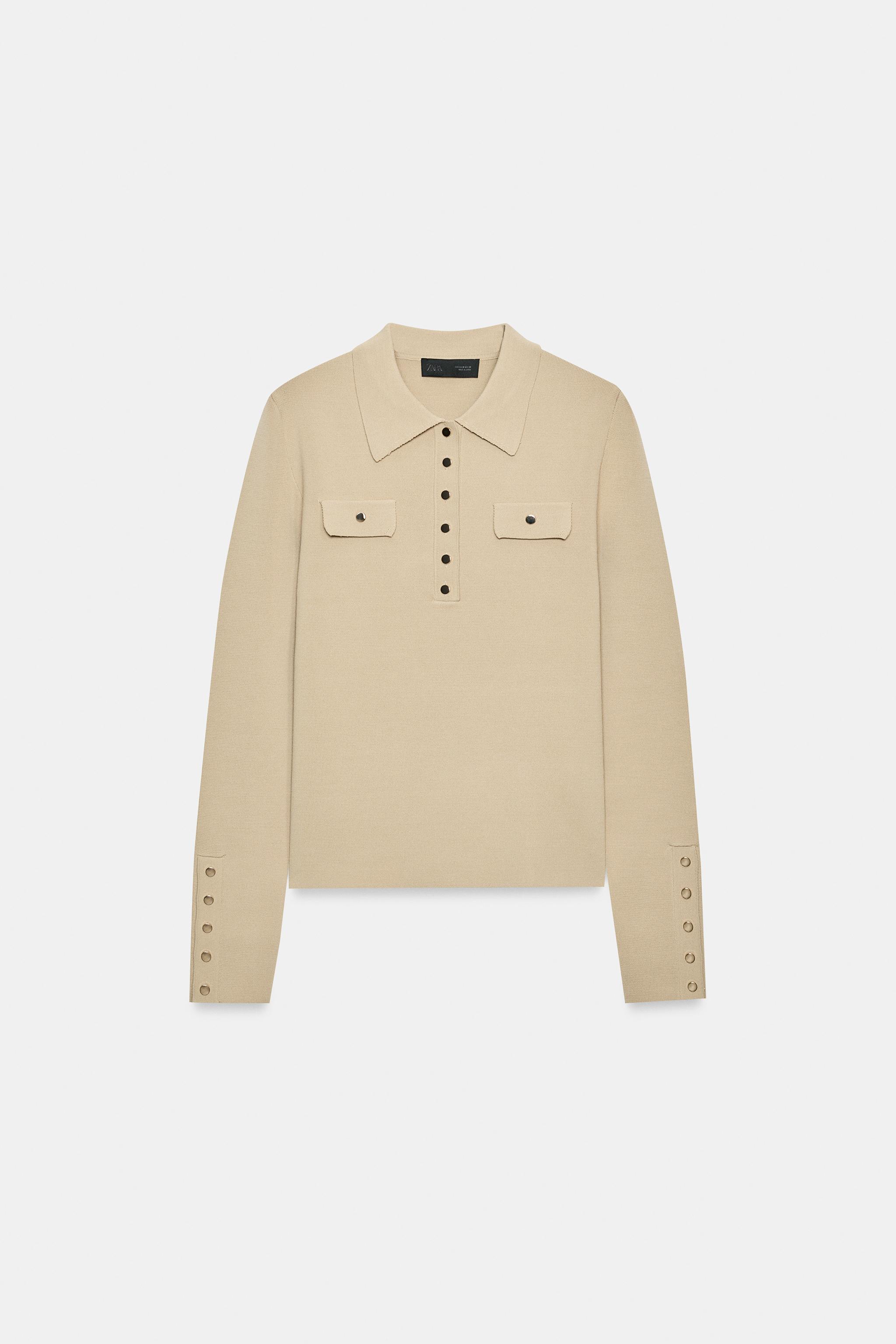 POLO EN MAILLE À PATTES DE BOUTONNAGE